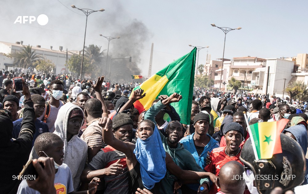 Senegal's main opposition leader called on Monday for much larger protests, but urged non-violence after days of deadly clashes in the West African state sparked by his recent arrest